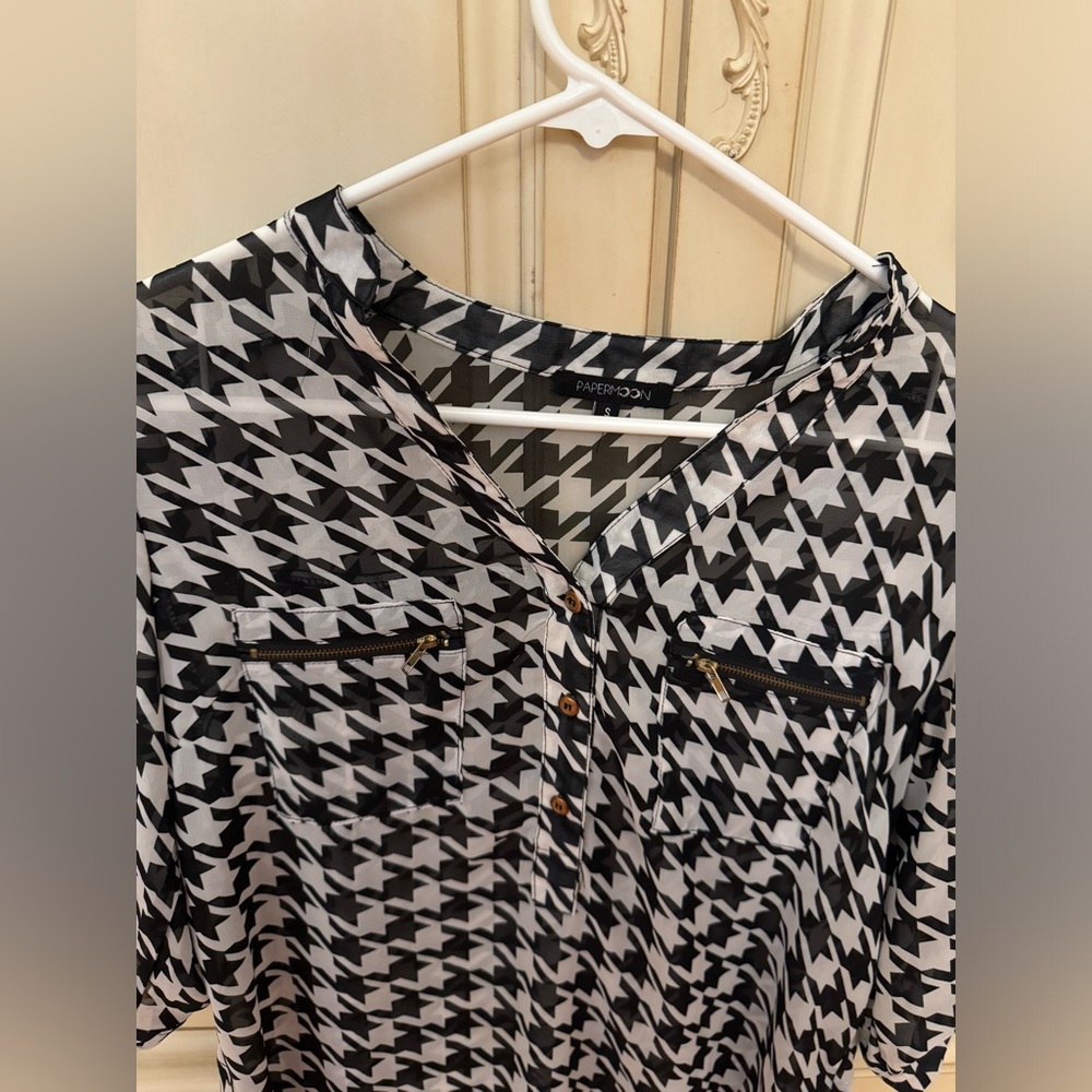 Black and white semi see through t shirt with front pockets